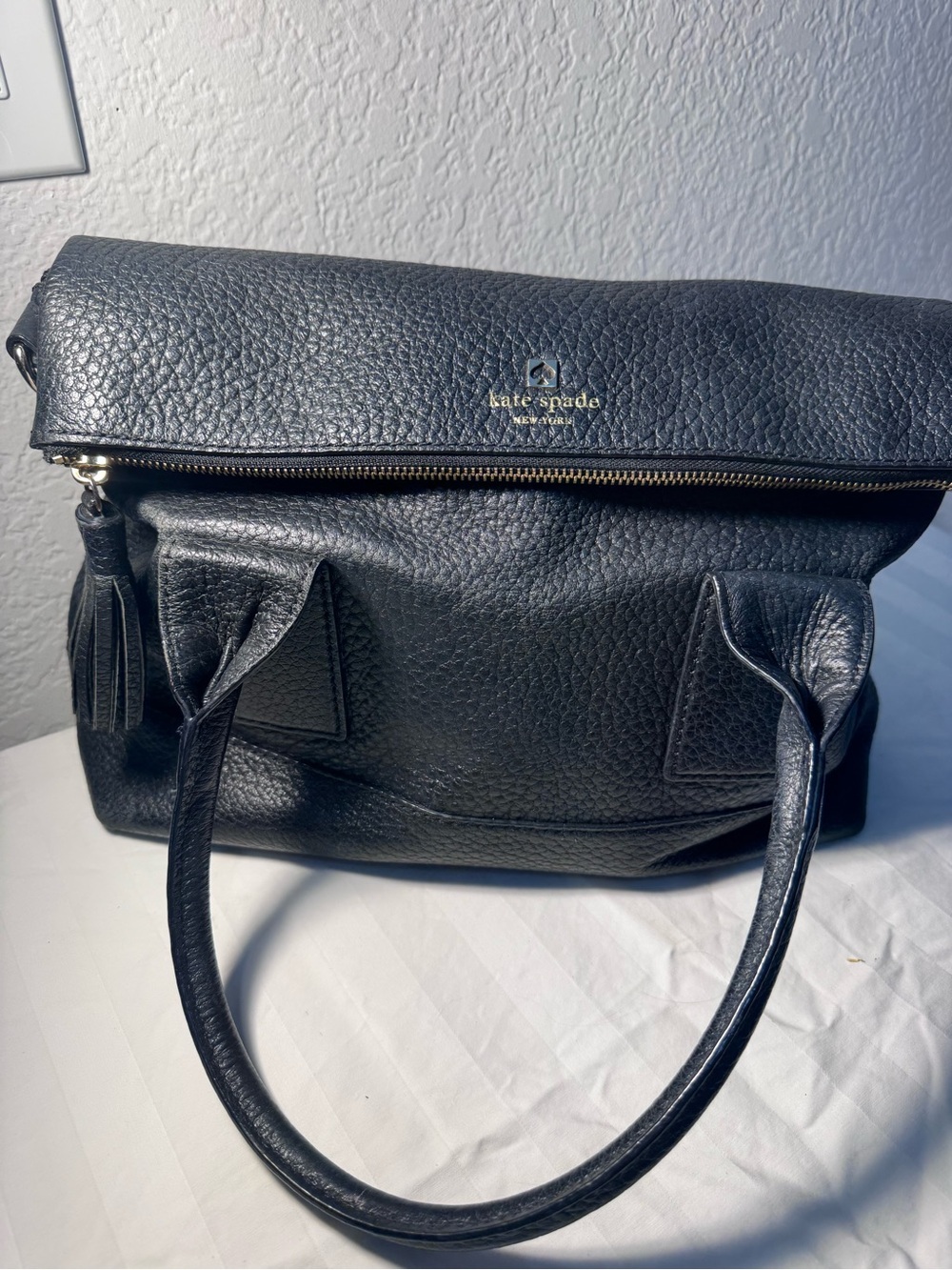 kate spade southport ave carmen black pebbled leather satchel with tassel zipper